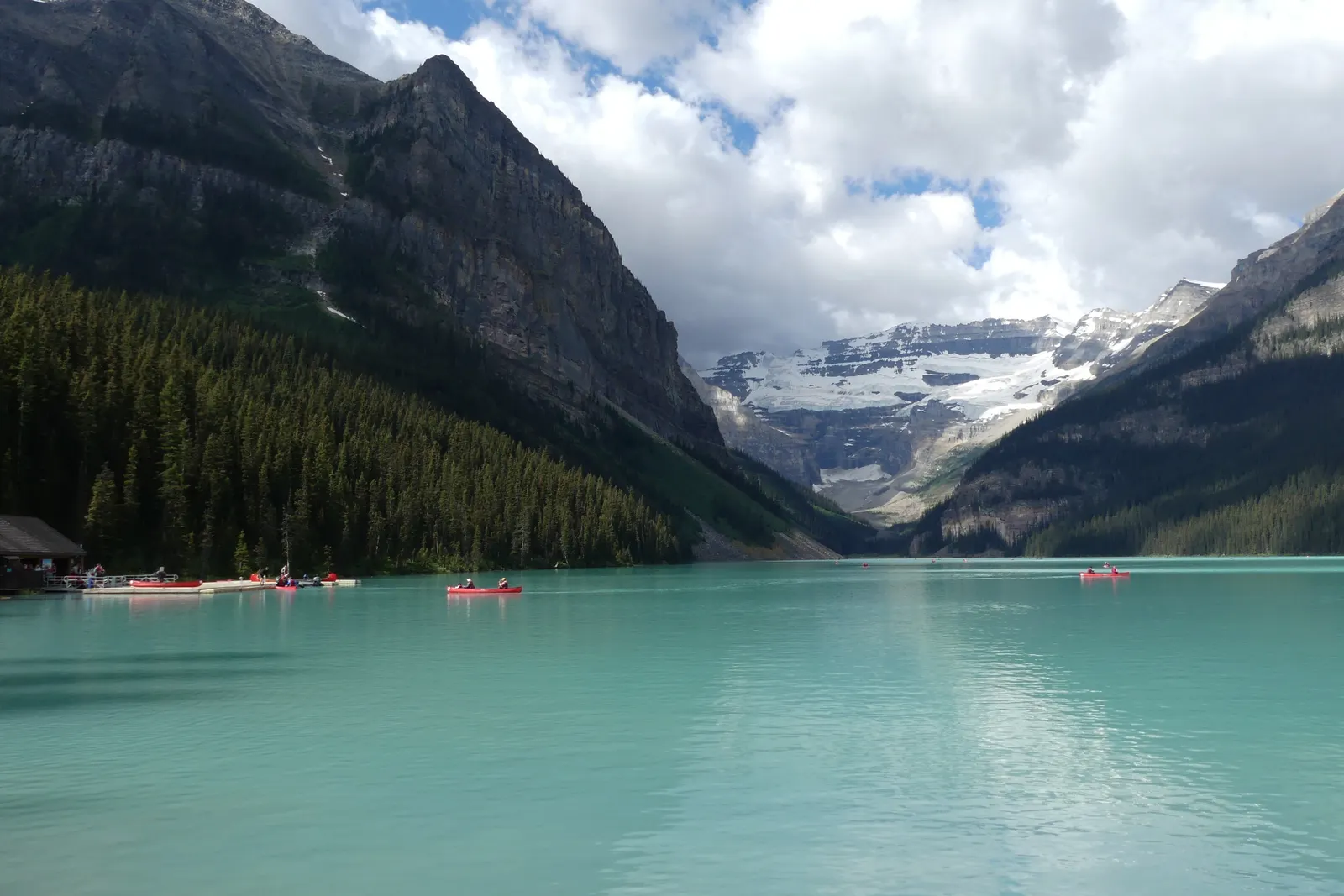 Turquoise Lake Louise beneath snow-streaked peaks in Banff National Park, Alberta