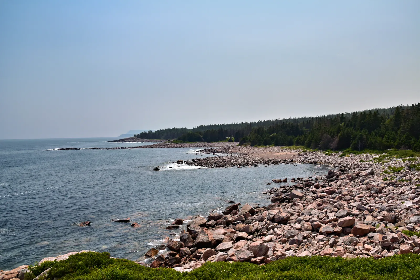 Rugged granite shoreline meeting the Atlantic Ocean in Nova Scotia